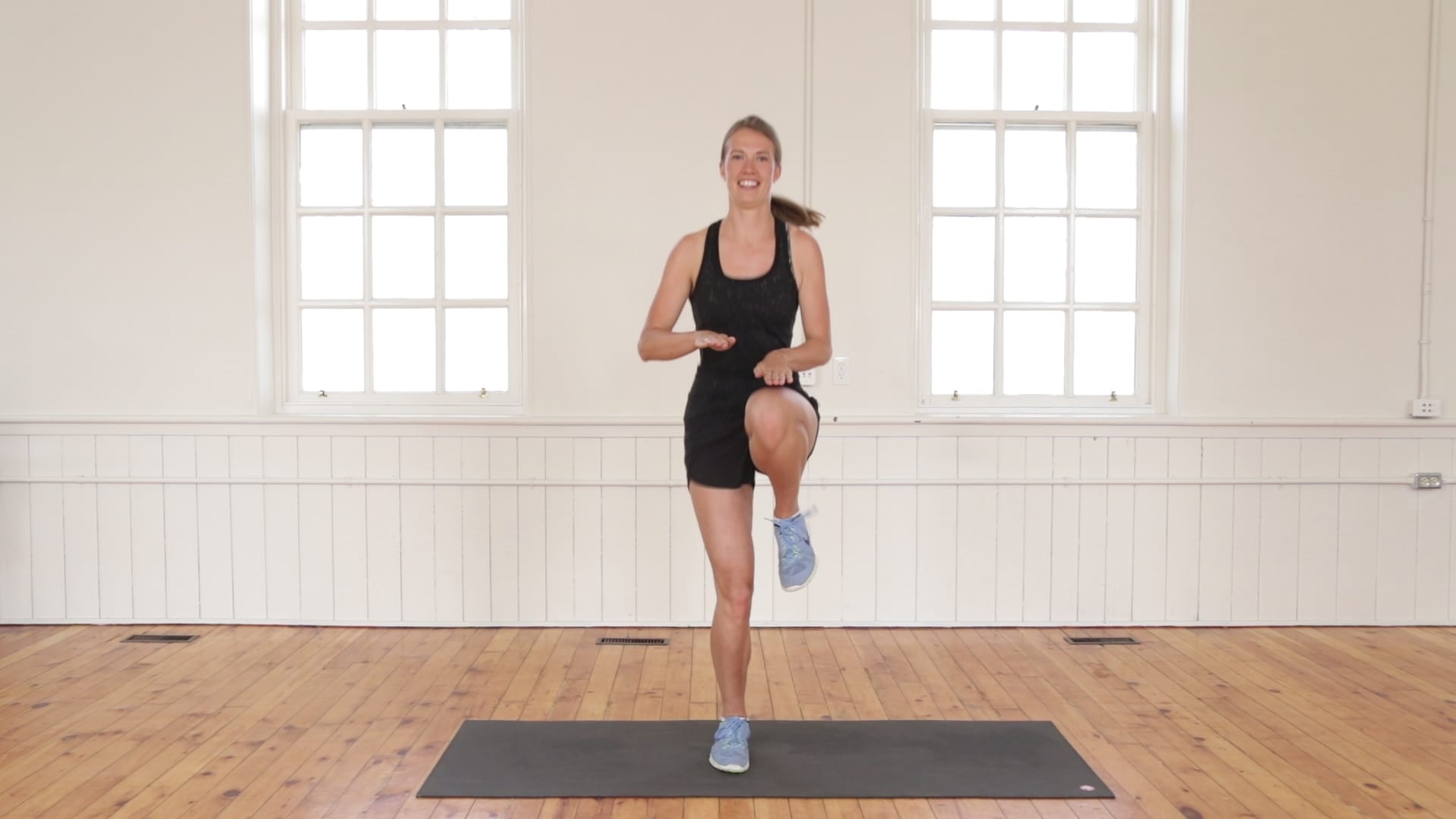 Girl Doing High Knees Exercise